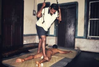 Traditional Chavitty Uzhichil foot massage treatment